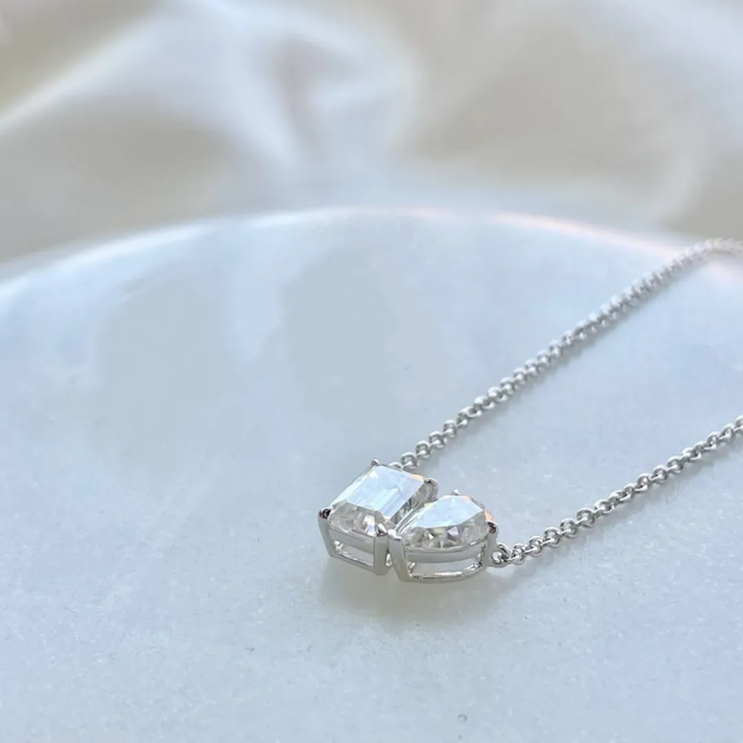 /public/photos/live/2 Stone Pear & Emerald Cut Moissanite Pendant 608 (2).webp